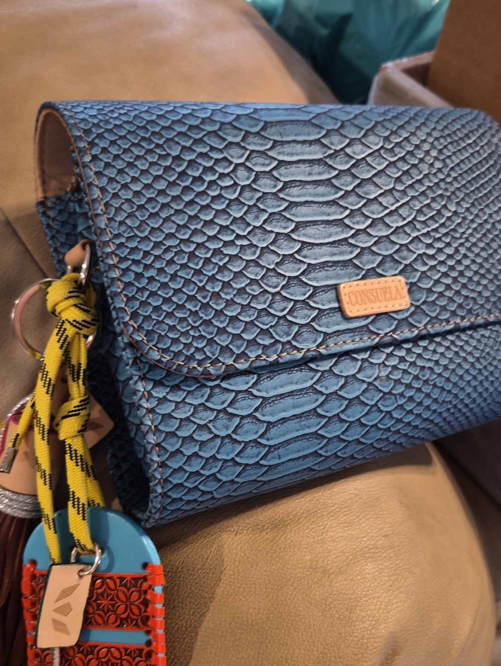 Consuela Turquoise Crossbody with Multicolor Tassel Charms Like New